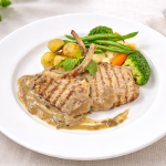 Grilled pork chop.mushroom sauce